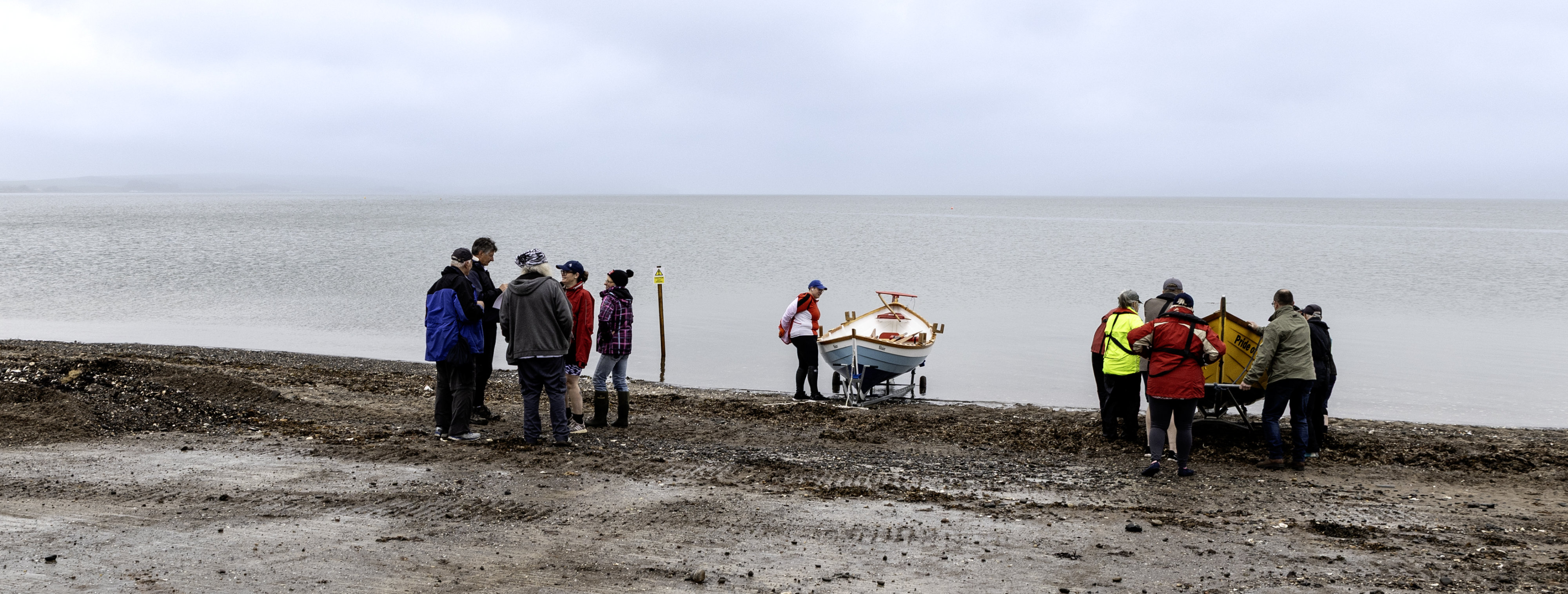 St Ayles coastal rowing boats on the edge of Loch Ryan