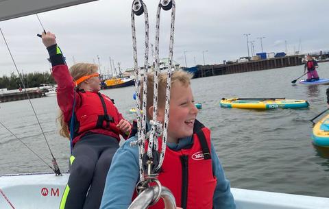 child enjoying watersports session