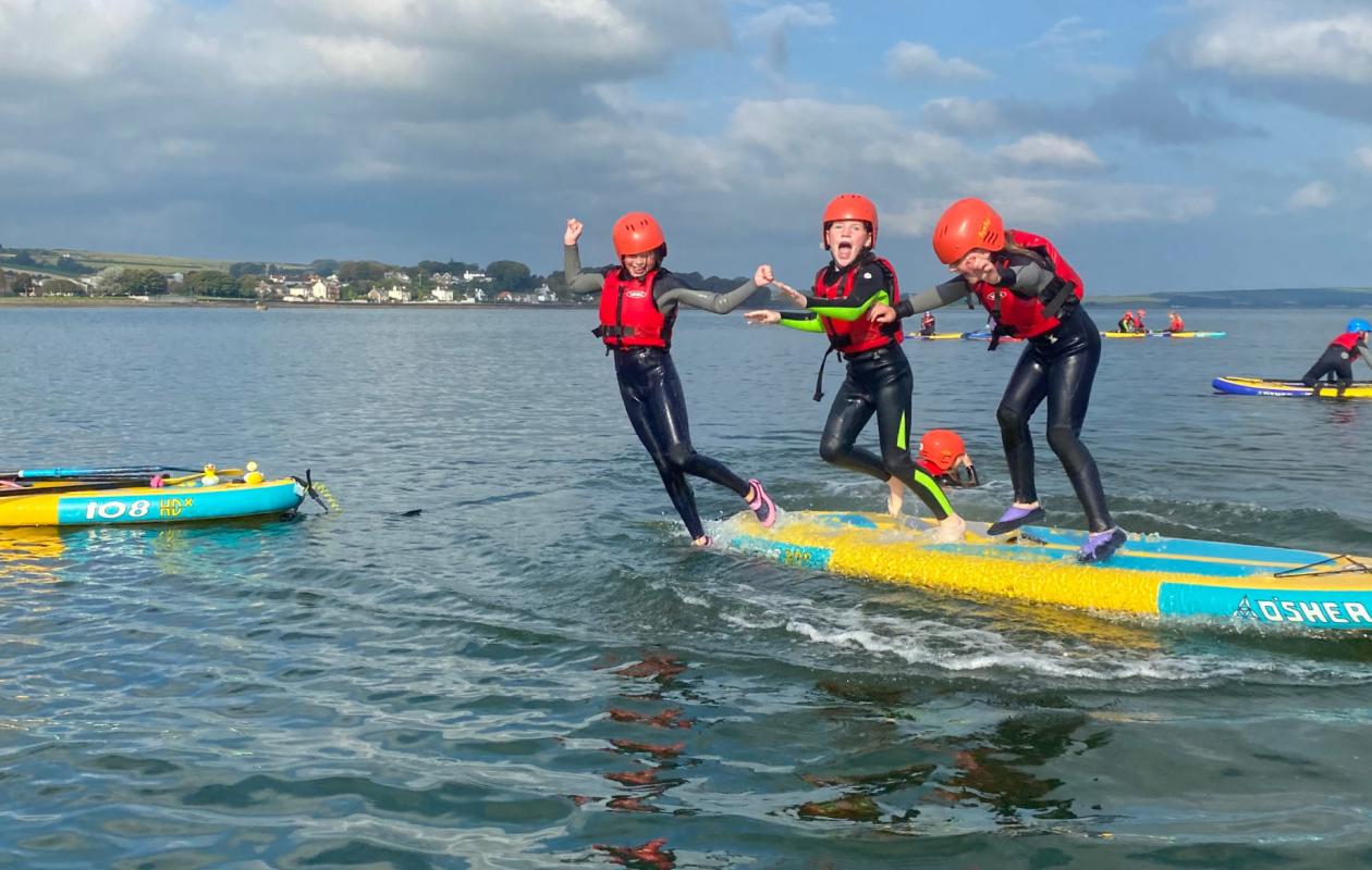Children on the water enjoying SWSA Kids Club
