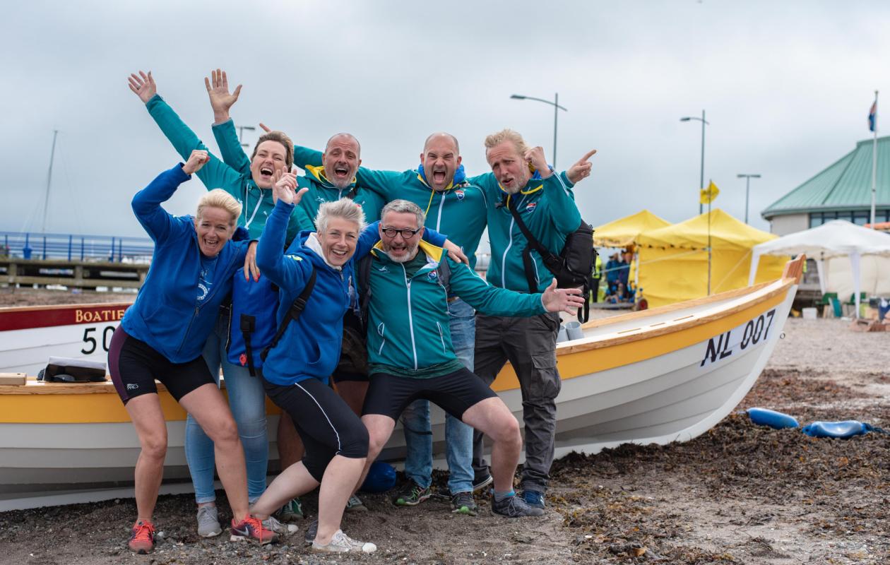 A Skiff crew celebrating